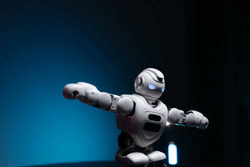 Innovative tech devices featuring a futuristic robot with articulated arms against a dark blue background