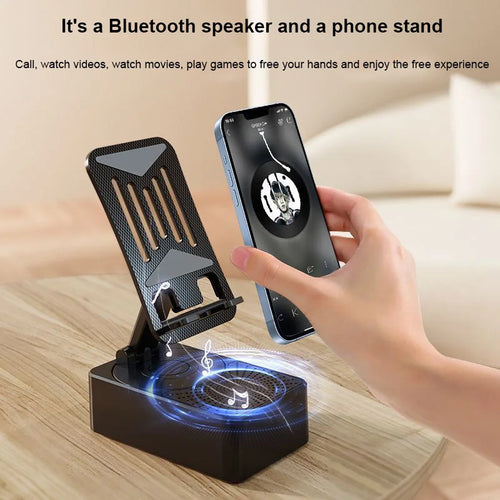 3 in 1 phone holder with speaker showing Bluetooth speaker and phone stand on wooden table